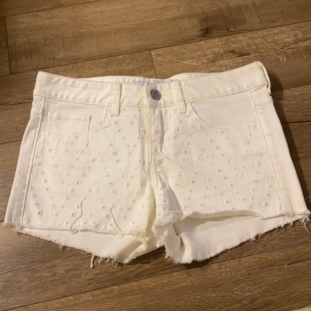 Express white patterned jean shorts